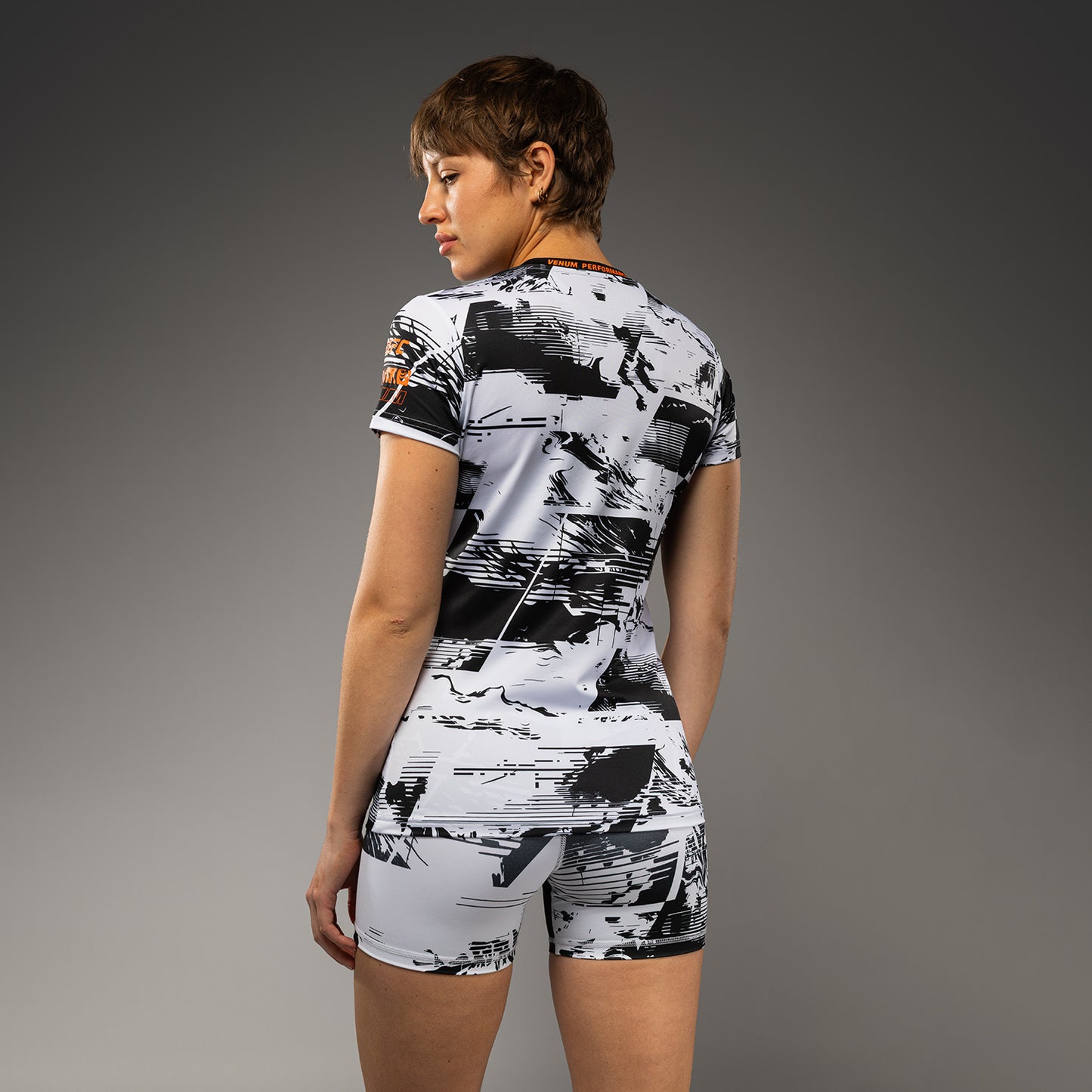 Women’s UFC Zenith by Venum 화이트 퍼포먼스 반팔 티셔츠